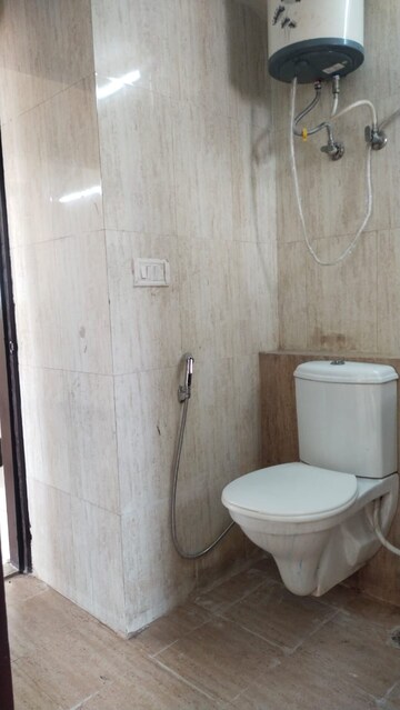 Bathroom in 2 BHK Apartment at Signature Orchard Avenue 2, Sector 93 – for Rent