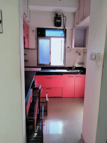 Kitchen in 1.5 BHK Apartment at Lodha Casa Royale, Balkum Pada – for Rent
