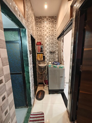 Building Lobby in 1 BHK Apartment at Nerul Sector 20 – for Sale