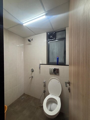 Bathroom in 1.5 BHK Apartment at Indiabulls One Indiabulls Park, New Panvel – for Rent