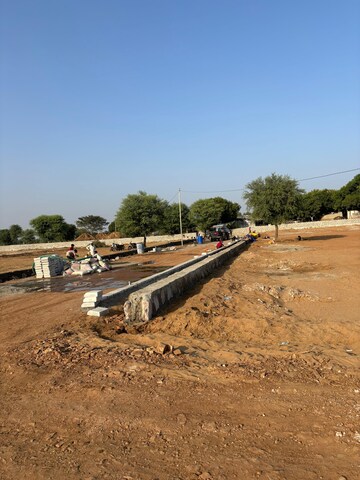 Plot Area in  Land at Bhati Village – for Sale