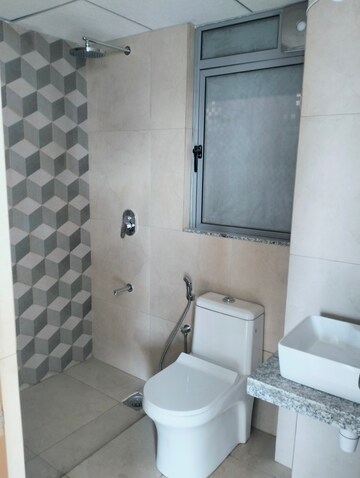 Bathroom in 2 BHK Apartment at Kalpataru Immensa, Kolshet Road – for Rent