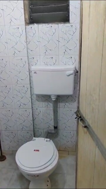 Bathroom in 2 BHK Apartment at Kopar Khairane – for Rent