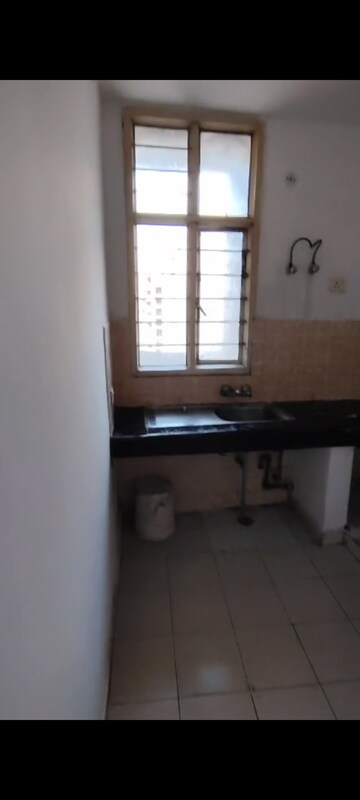 Kitchen in 3 BHK Apartment at Jaipurias Sunrise Greens, Ahinsa Khand 1 – for Sale