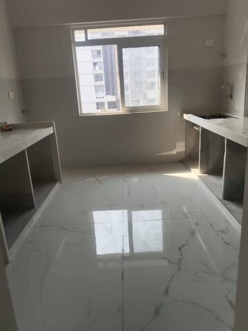 Kitchen in 3 BHK Apartment at Khandeshwar – for Sale