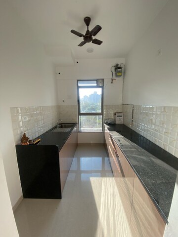 Kitchen in 2 BHK Apartment at Kalpataru Parkcity, Kolshet Industrial Area – for Rent