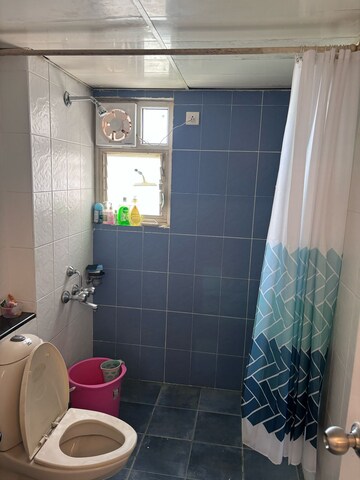 Bathroom in 3 BHK Apartment at Brigade Harmony, Whitefield – for Rent