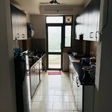 Kitchen in 3 BHK Apartment at Nimbus The Hyde park, Sector 78 – for Rent