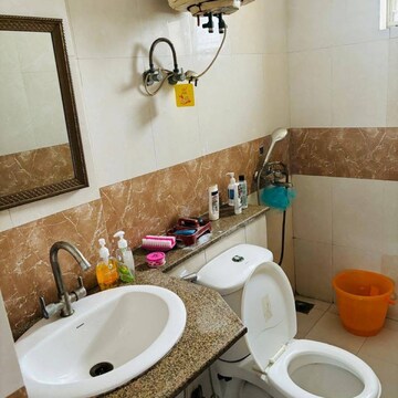 Bathroom in 3 BHK Apartment at Nimbus The Hyde park, Sector 78 – for Rent