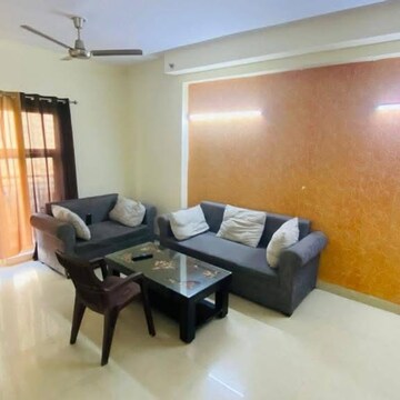 Living Room in 3 BHK Apartment at Aims Golf City, Noida Central – for Rent