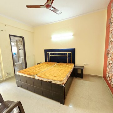 Bedroom in 3 BHK Apartment at Aims Golf City, Noida Central – for Rent