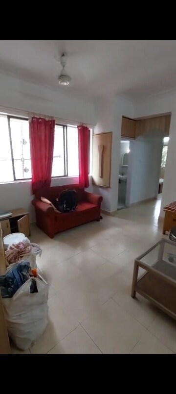 Living Room in 1 BHK Apartment at Poonam Enclave, Goregaon East – for Rent
