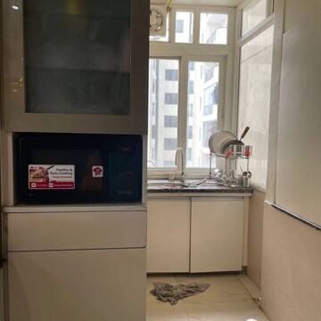 Kitchen in 3 BHK Apartment at Mahagun Mirabella, Sector 79 – for Rent