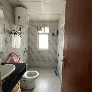 Bathroom in 3 BHK Apartment at Mahagun Mirabella, Sector 79 – for Rent