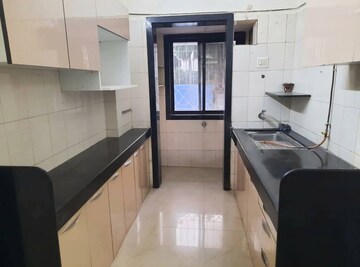 Kitchen in 2 BHK Apartment at Atul Blue Empire, Kandivali West – for Sale