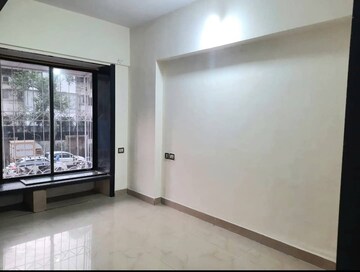 Bedroom in 2 BHK Apartment at Atul Blue Empire, Kandivali West – for Sale