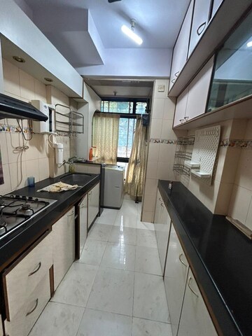 Kitchen in 4 BHK Apartment at Thakur Vishnu Shivam Tower, Kandivali East – for Sale
