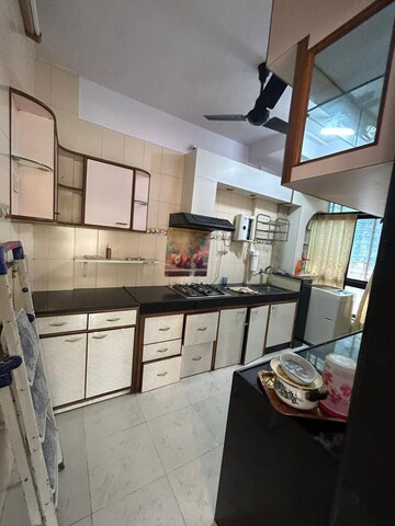 Kitchen in 4 BHK Apartment at Thakur Vishnu Shivam Tower, Kandivali East – for Sale