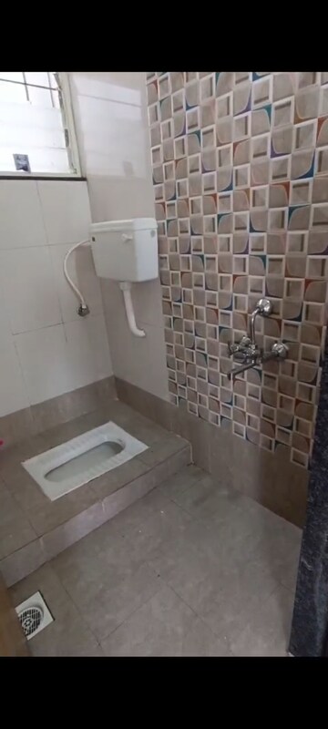 Bathroom in 2 BHK Apartment at Vaishnavi City, Uruli Devachi – for Sale