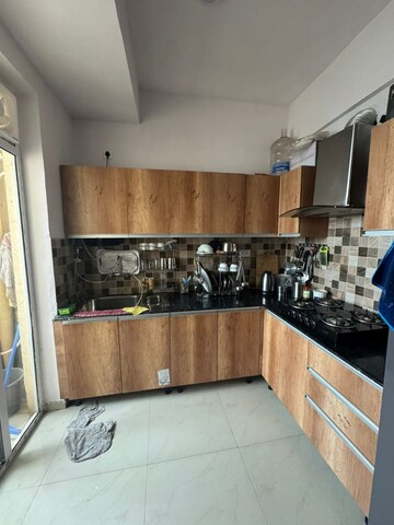 Kitchen in 1.5 BHK Apartment at Prateek Grand City, Siddharth Vihar – for Rent