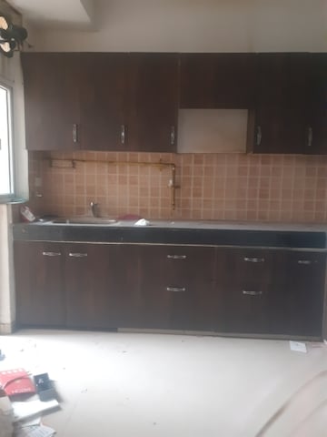 Kitchen in 2 BHK Apartment at Exotica Dreamville, Sector 16c Greater Noida – for Rent