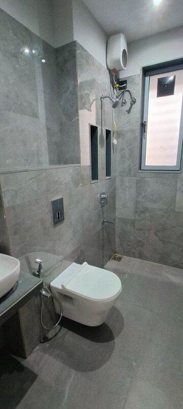 Bathroom in 2 BHK Apartment at Rishabraj Blue Lotus, Khar West – for Rent