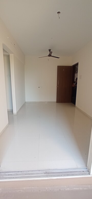 Room in 1 BHK Apartment at Akshar River Gate, Rasayani – for Rent