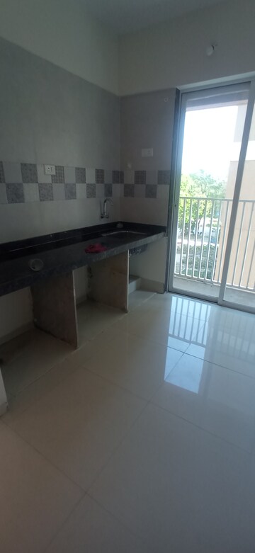 Kitchen in 1 BHK Apartment at Akshar River Gate, Rasayani – for Rent