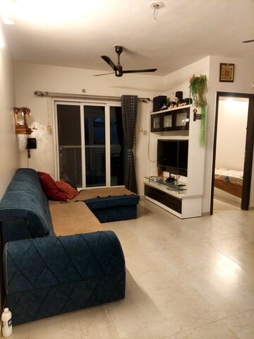 Living Room in 1.5 BHK Apartment at Dosti West County, Balkum Pada – for Rent