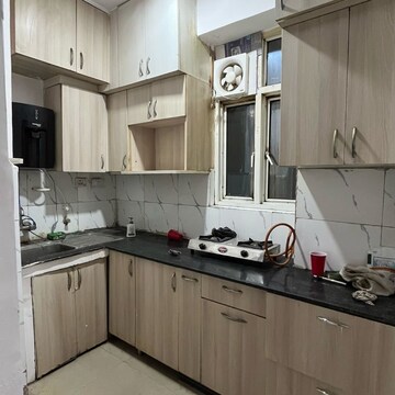 Kitchen in 3 BHK Apartment at Sethi Max Royale, Sector 76 – for Rent