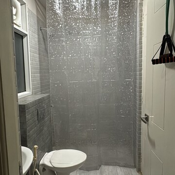 Bathroom in 3 BHK Apartment at Mahagun Mirabella, Sector 79 – for Rent
