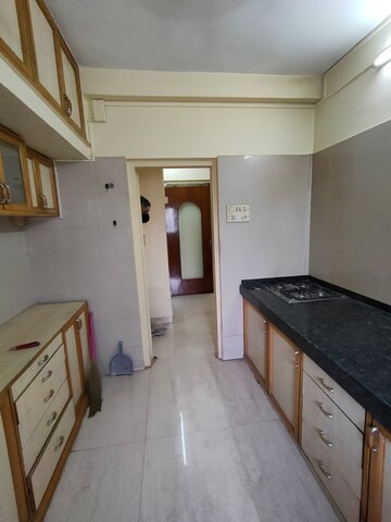Kitchen in 2 BHK Apartment at PR Prahlad B, Santacruz West – for Rent