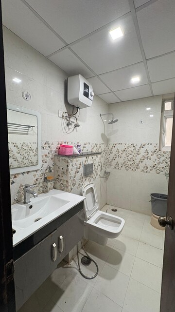 Bathroom in 3 BHK Apartment at MI Rustle Court, Gomti Nagar – for Rent