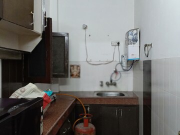 Kitchen in 2 BHK Apartment at Khirki Extension – for Rent