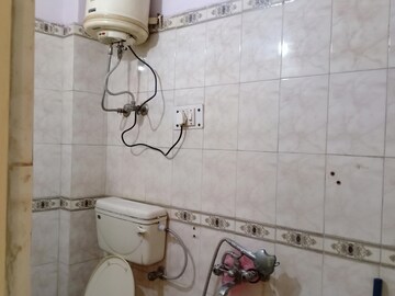 Bathroom in 2 BHK Apartment at Khirki Extension – for Rent