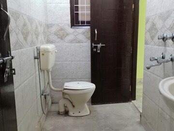 Bathroom in 2 BHK Apartment at Khirki Extension – for Rent