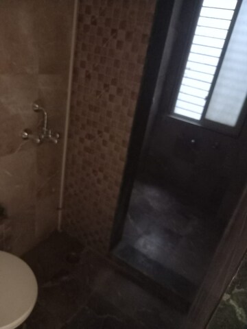 Bathroom in 2 BHK Apartment at Mohan Suburbia, Ambernath West – for Sale