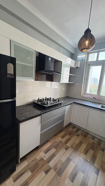 Kitchen in 2 BHK Apartment at Chandra Panorama, Sushant Golf City – for Rent