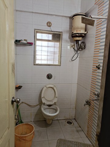 Bathroom in 2 BHK Apartment at Cosmos Lounge, Manpada – for Sale
