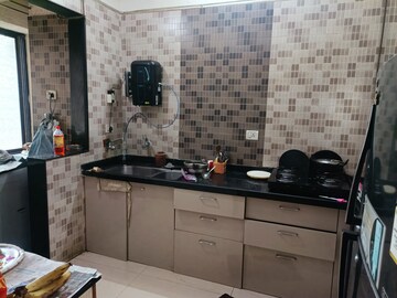 Kitchen in 2 BHK Apartment at Cosmos Lounge, Manpada – for Sale