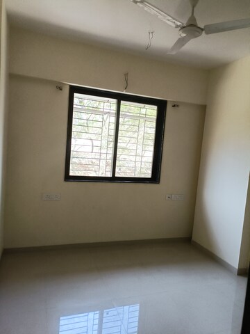 Room in 2 BHK Apartment at K M Horizon Palms III, Owale – for Sale