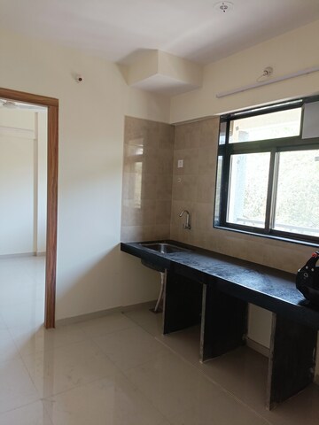 Kitchen in 2 BHK Apartment at K M Horizon Palms III, Owale – for Sale