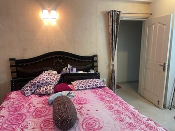 Bedroom in 3 BHK Apartment at Prateek Wisteria, Sector 77 – for Rent