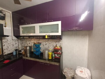 Kitchen in 1 BHK Apartment at Cosmos Orchid, Ghodbunder Road – for Sale