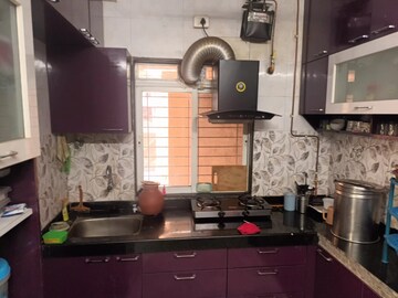 Kitchen in 1 BHK Apartment at Cosmos Orchid, Ghodbunder Road – for Sale
