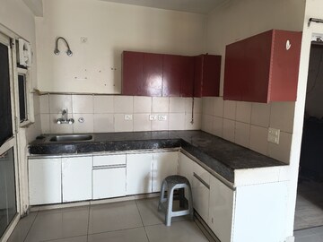 Kitchen in 2.5 BHK Apartment at Amrapali Golf Homes, Sector 4, Greater Noida – for Rent