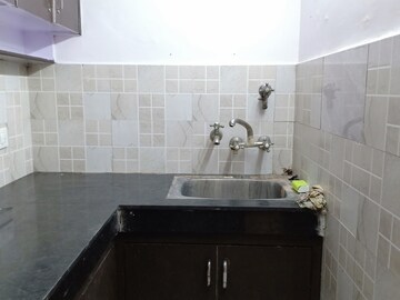 Kitchen in 2 BHK Apartment at Khirki Extension – for Rent