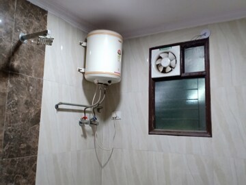 Bathroom in 2 BHK Apartment at Khirki Extension – for Rent