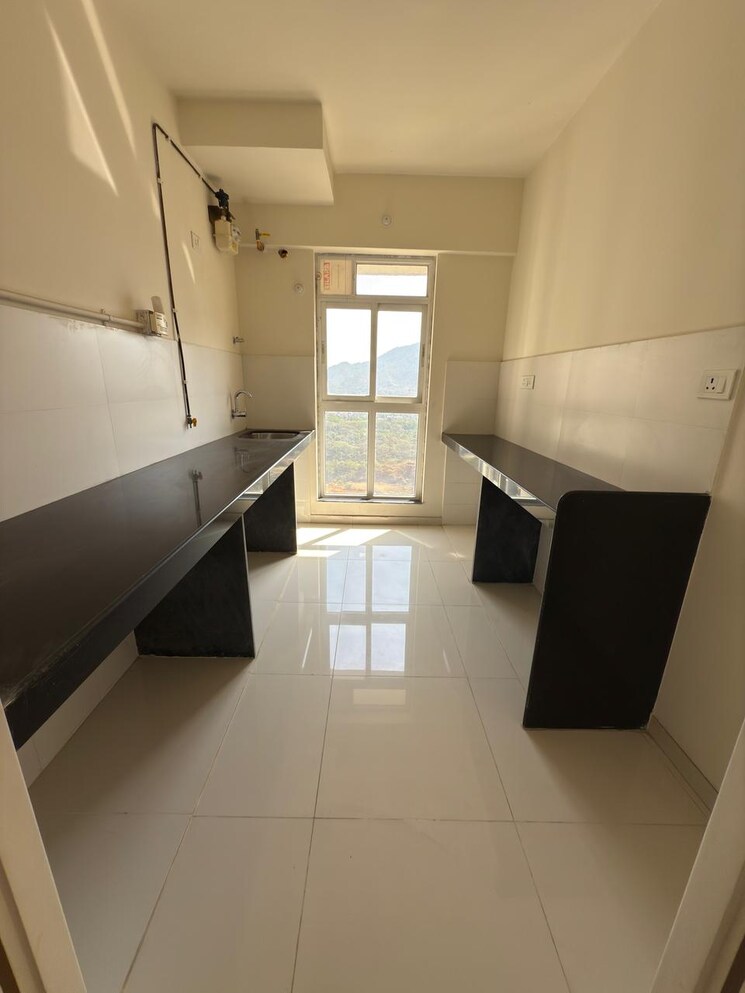 Kitchen, godrej-emerald 2 Bedroom 721 Sq.Ft. Apartment In Ghodbunder Road Thane 8248605