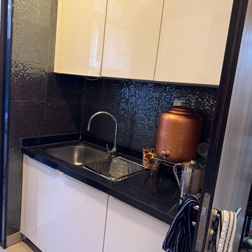 Kitchen in 3 BHK Apartment at Sheth Vasant Lawns, Oswal Park – for Rent